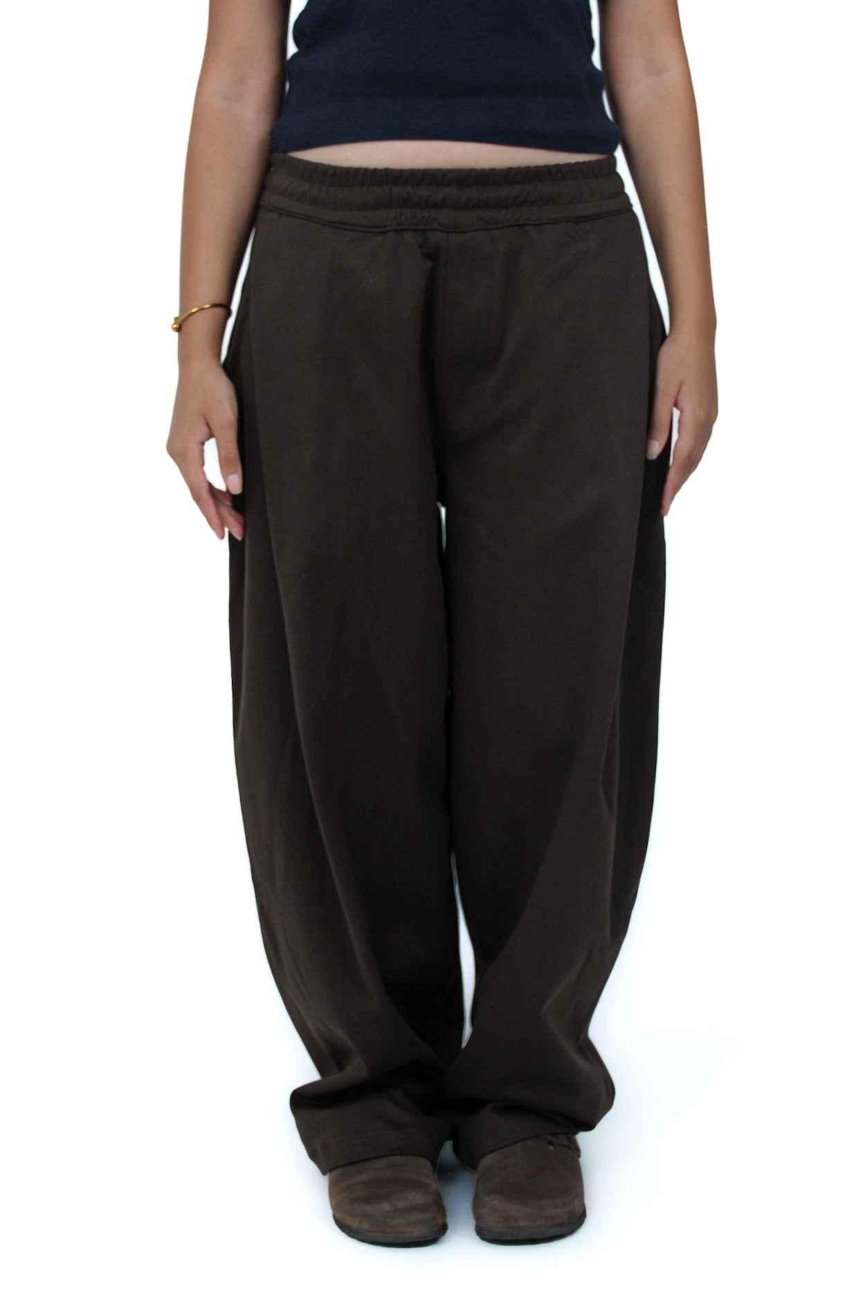 Pleated Balloon-Fit Pants in Brown, front view on model