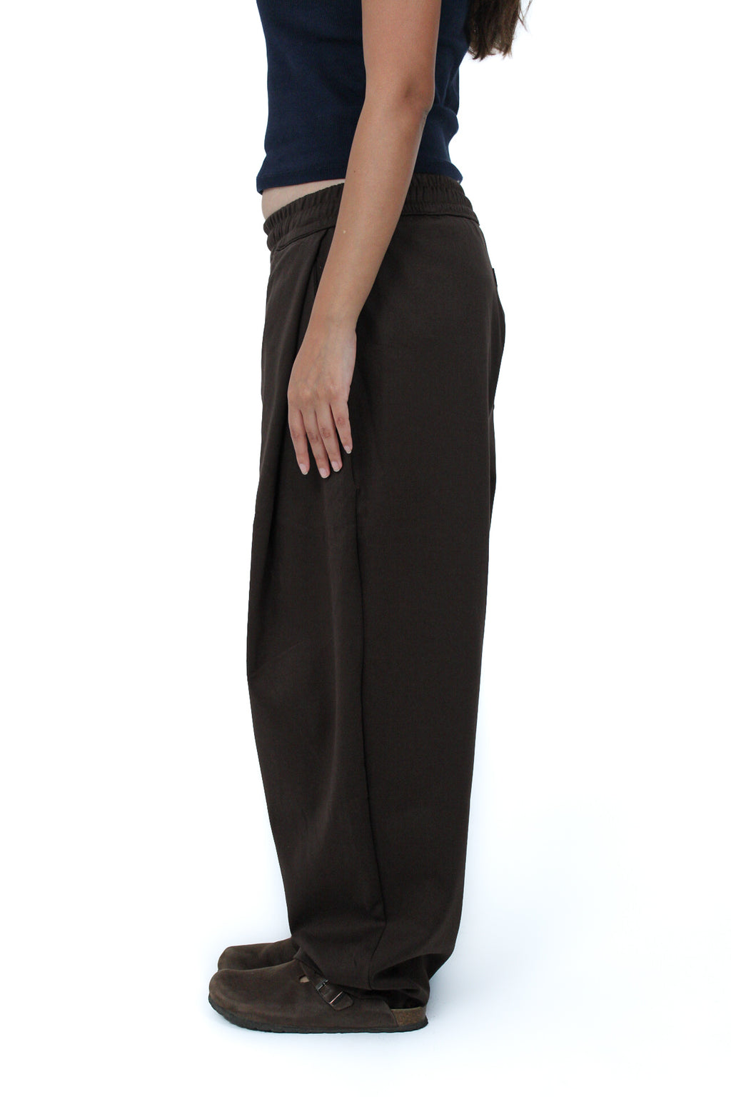 Pleated Balloon-Fit Pants in Brown, side view on model